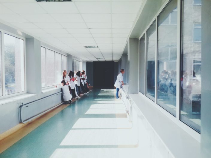 doctors-glass-hallway-127873 Doctors in Hallway Stock Image
