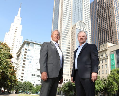 Brett Hall and Stacy Rudd standing in Dallas, TX