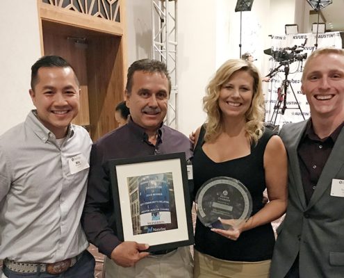 Texas team holding Community Relations award