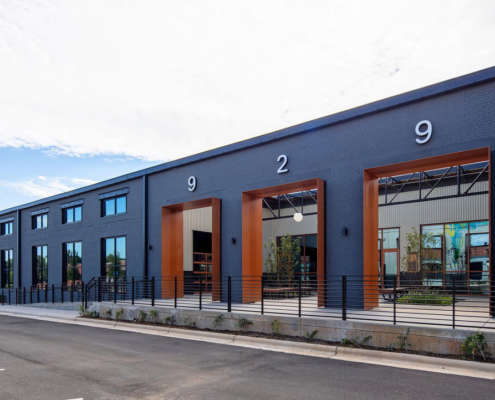 Swinerton's Special Projects team performed the adaptive reuse of a former warehouse building in Charlotte, N.C., into office spaces for three tenants. The project included bringing the outdoors into the workspaces. Image: Courtesy of Swinerton