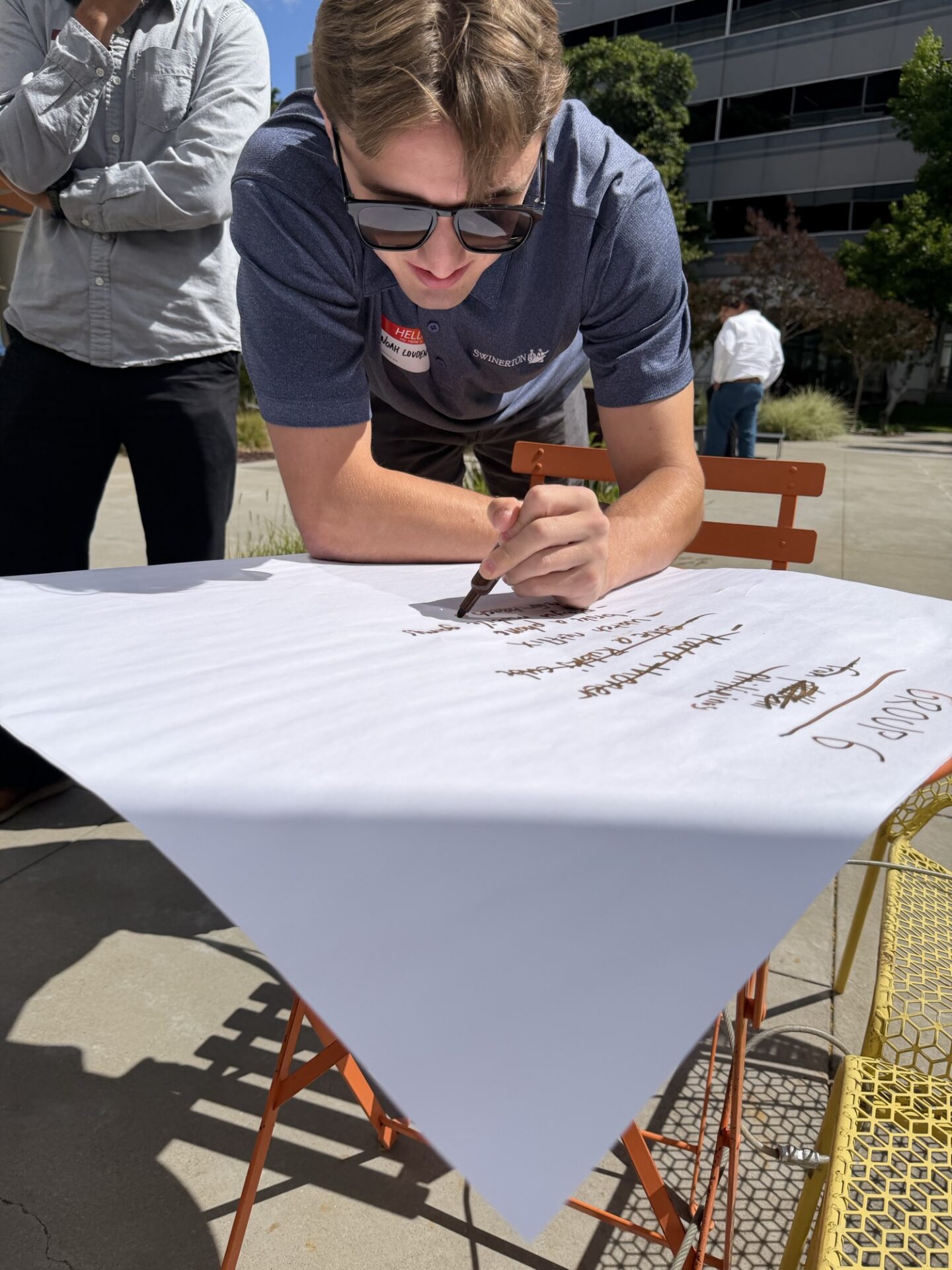 An intern reviewing construction plans